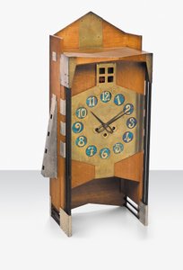 Mantel-kello, n. 1907 (tammi, messinki värikkäillä Loetzin lasinumeroilla) tekijältä Gustave Serrurier Bovy