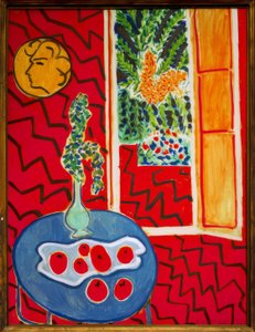 Punainen sisustus, asetelma sinisellä pöydällä tekijältä Henri Matisse
