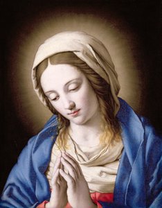 Madonna rukoilee