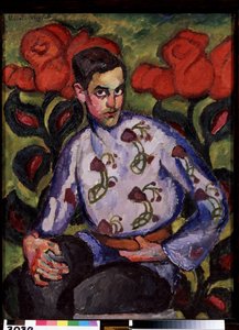 Pojan muotokuva paidassa, jossa on kukkia. Ilja Ivanovitš Mashkov (Ilia Mashkov, Matchkov) maalaus (1881-1944), öljy kankaalle tekijältä Ilya Ivanovich Mashkov