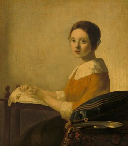Lacemaker tekijältä Imitator of Johannes Vermeer