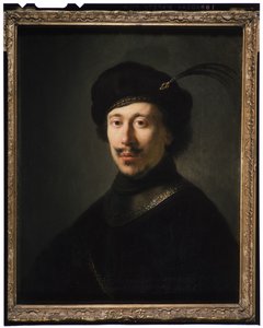 Nuori mies rotkossa ja muhkeassa lippassa, n. 1630