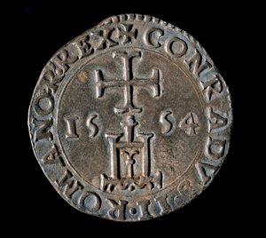 Geenitasavallan valuutta: Siunauksen hopeateston (tai testone). Etuosa edustaa Genovan portaalia ristin alla. 1554 Genes, Musei di Strada Nuova tekijältä Italian School