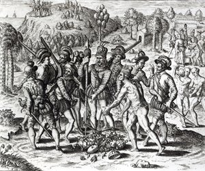 Espanjalaiset vastaanottamassa lahjoja intialaisista, "Historia", 1598, kaiverrus Theodor de Bry (1528-98) tekijältä Jacques Le Moyne