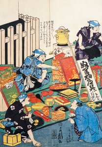 Teline, jossa on laatikoita, tuulettimia, kirjoja ja kakemonoja tekijältä Japanese School