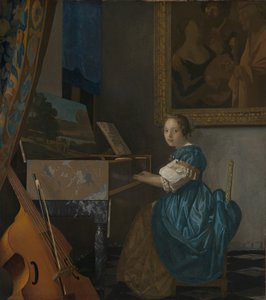 Eine junge Frau sitzt an einem Virginal tekijältä Johannes Vermeer