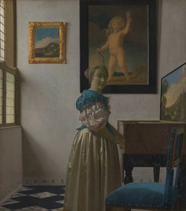 Eine junge Frau an einem Virginal tekijältä Johannes Vermeer