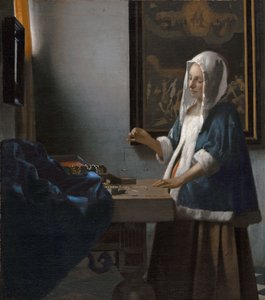 Nainen, joka pitää tasapainoa tekijältä Johannes Vermeer