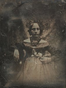 Nuori nainen, jolla on kukka, n. 1842.