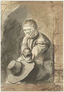 istuva mies