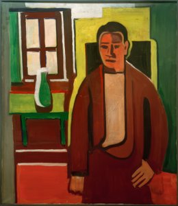 Mies seisoo ikkunan edessä tekijältä Karl Tratt