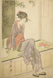 Nainen istuu verannalla tekijältä Kitagawa Utamaro