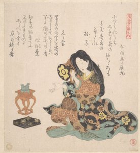 Tsuzumia soittava nainen