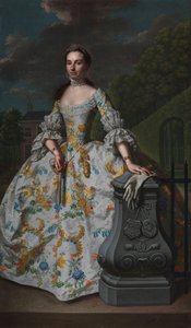 Charlotte Beatrix Strick van Linschotenin muotokuva Muotokuva Charlotte Beatrix Strick van Linschotenista (s. 1732), Gerard Cornelis van Riebeeckin toisesta vaimosta, oletettavasti seisomassa maalaistalonsa Eemwijckin edessä Voorburgissa