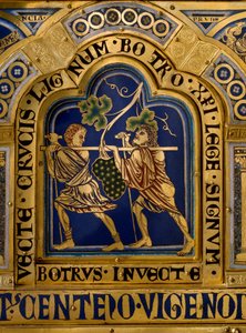 Nicolas de Verdunin (n. 1130/50-1205) kullasta ja emalista tekemä Verdun-alttari: kohtauksia Vanhasta ja Uudesta testamentista: yksityiskohta, joka edustaa Josuen ja Calebin paluuta valtavan viinirypäletertun kanssa Kanaanin maasta (Luvattu Maa). 1100-luvu