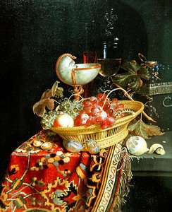 Hedelmien asetelma korissa ja Nautilus-kuppi tekijältä Nicolaes Van Gelder