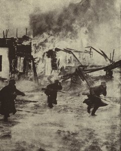 Saksalaiset sotilaat etenevät Rotterdamin palavien raunioiden läpi Luftwaffen pommituksen jälkeen, toinen maailmansota, toukokuu 1940 (m/v kuva) tekijältä Photographer German