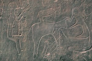 Ihmishahmot ja eläimet (kalliomaalaus) tekijältä Prehistoric