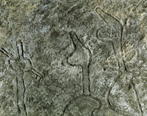 Esihistoriaa, kalliotaidetta: petroglyfi (graffiti kivellä) metsästyskohtauksesta. neoliittinen, kivikausi. (Azerbaidžan) Pronssikausi. Baku, Azerbaidžanin valtion uskontohistoriallinen museo tekijältä Prehistoric Prehistoric
