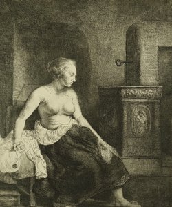 Nainen istumassa puolipukeutuneena lieden vieressä, 1658 tekijältä Rembrandt van Rijn