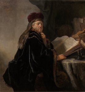 Pöydän ääressä oleva tutkija Tutkija työhuoneessaan tekijältä Rembrandt van Rijn