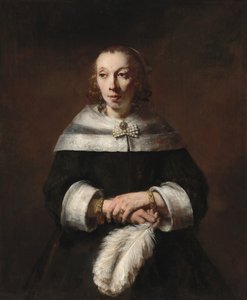 Naisen muotokuva strutsiviuhkan kanssa tekijältä Rembrandt van Rijn