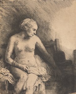 Nainen kylpyammeessa, jonka vieressä on hattu tekijältä Rembrandt van Rijn