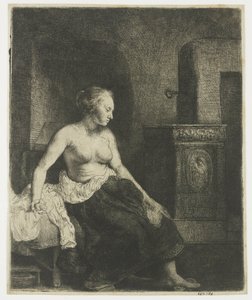 Nainen istuu puolipukeutuneena lieden vieressä tekijältä Rembrandt van Rijn
