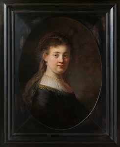 Nuori nainen fantasiaasussa tekijältä Rembrandt van Rijn