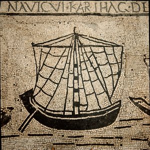 Roomalainen taide: rahtilaiva. Mosaiikki 3. vuosisadalta jKr. Ostia, Ostia, Piazzale delle Corporazioni. Italia - Roomalainen taide: laiva lastattu tavaralla. Lattian mosaiikki. 3. vuosisadalla eaa. Piazzale delle Corporazioni, Ostia, Italia tekijältä Roman