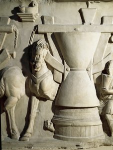 Roomalainen taide: matala kohokuvio, joka edustaa myllyn pyörää. 1. vuosisadalla jKr. Rooman Museo della Civilta Romana tekijältä Roman