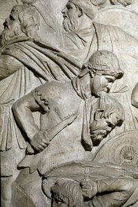 Roomalainen taide: "" Roomalainen soturi pitelee hampaidensa välissä vihollissoturin päätä"" Muotti vuodelta 1862, joka jäljittelee Roomassa keisari Trajanuksen aikana rakennetun Trajanuksen pylvään (Trajane-pylväs) (Colonna Traiana) bareljeefejä ( 53-117) tekijältä Roman Roman