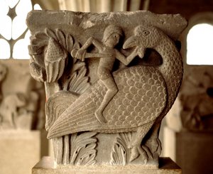 Kuvaus miehen ja linnun välisestä taistelusta (kappitalon veistetty pääkaupunki) tekijältä Romanesque