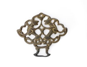 Ornamentti leijonaparilla, Seljud-dynastia, mahdollisesti 1200-luku (pronssi kullan jälkiä)