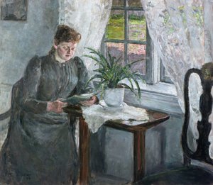 Sisustus, jossa nainen lukee
