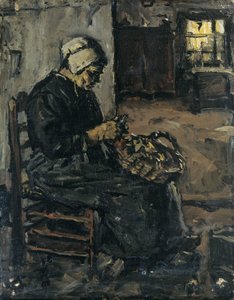 Talonpoikanainen kuorii perunoita