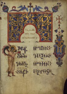 Alkukirjain evankelista Matteuksen symbolilla
