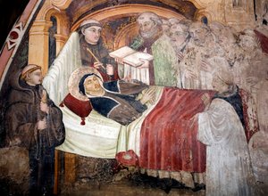 Pyhän Benedictin Nursielaisen sisaren Saint Scolasticuksen (jae 480-543) kuolema Häntä ympäröivät benediktiinimunkit. Umbrian koulukunnan fresko 1400-luvulta. Pyhän Benedetton luostari (Sacro Speco), Subiaco (Rooma), Italia
