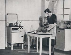 Brittiläinen keittiö, jossa on kaappikaasuliesi, 1942. tekijältä Unbekannt