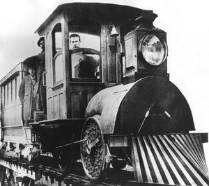 Amerikkalainen keksijä Thomas Alva Edison sähkörautatiellä, 1892 tekijältä Unbekannt