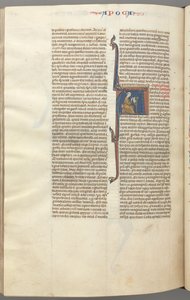 Fol. 482v, Revelations, historiallinen alkukirjain A, John istuu pöydän ääressä kirjoittaen..., n. 1275-1300. tekijältä Unbekannt