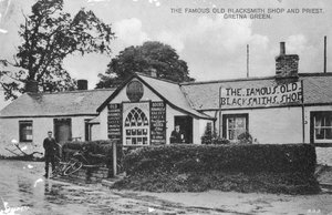 Kuuluisa vanha seppäliike, Gretna Green, Dumfriesshire, Skotlanti, 1900-luku tekijältä Unbekannt