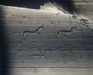 Italia, Lombardia, Camonican laakso, kalliopiirrokset kalliolla tekijältä Benjamin Baud