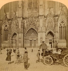 Pääportaali ja taidokkaasti koristeltu julkisivu, Tuomiokirkko, Köln, Saksa, 1902. tekijältä Underwood and Underwood