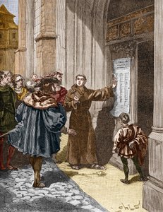 Martti Luther (1483-1546) ripustaa 95 teesiään Wittenbergissä