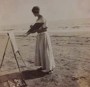 nuori taidemaalari rannalla Forte dei Marmin rannalla Italiassa. tekijältä Unknown photographer