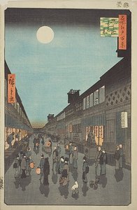 Yönäkymä Saruwaka-machista (Saruwaka-machi yoru no kei), nro 90 sarjasta "Sata kuuluisaa näkymää Edosta (Meisho Edo hyakkei)". tekijältä Utagawa Hiroshige