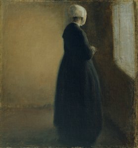 Vanha nainen seisoo ikkunan vieressä tekijältä Vilhelm Hammershøi