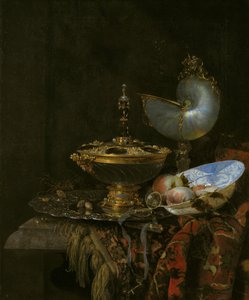 Pronk asetelma Holbein Bowlilla, Nautilus Cupilla, lasikupilla ja hedelmälautasella tekijältä Willem Kalf