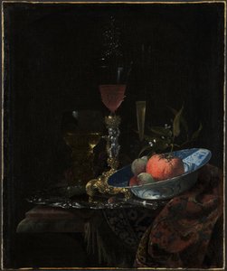 Viinilasi ja kulhollinen hedelmää tekijältä Willem Kalf